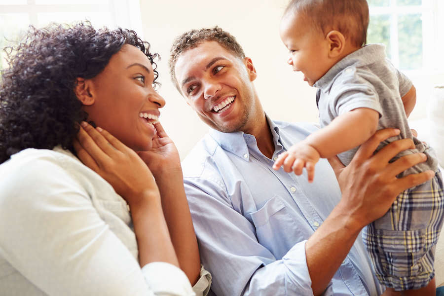 Picture of mother and father with baby